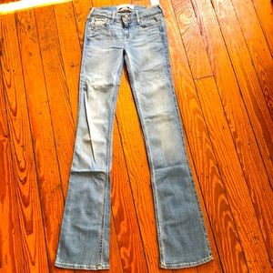 Low-rise bootcut jeans by Hollister. Size 00L. (W23/L35). Light wash. NWT.
